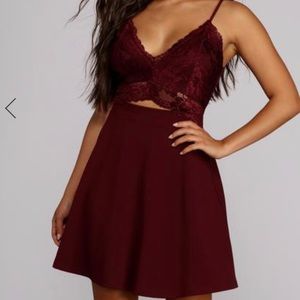 A burgundy lace dress